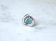 Bague 53.5 Bague marguerite cabochon en or blanc et platine, aigue-marine et diamants 58 Facettes