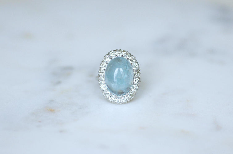 Bague 53.5 Bague marguerite cabochon en or blanc et platine, aigue-marine et diamants 58 Facettes