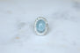 Bague 53.5 Bague marguerite cabochon en or blanc et platine, aigue-marine et diamants 58 Facettes