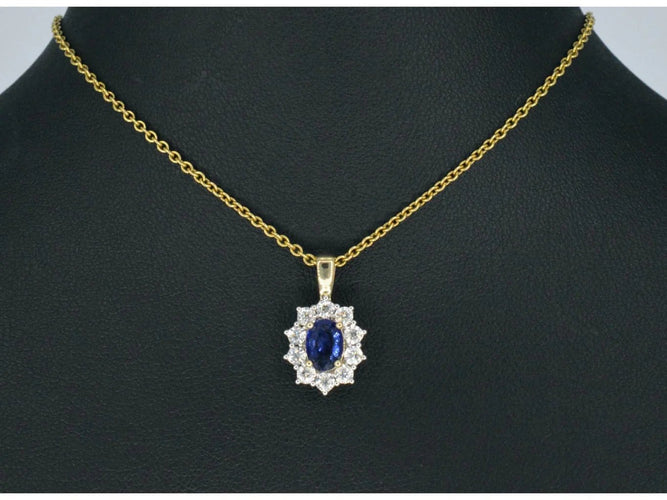 Pendentif Pendentif entourage en or jaune 14 carats, saphir et diamants 58 Facettes 2300
