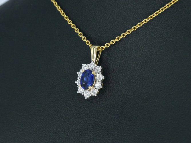 Pendentif Pendentif entourage en or jaune 14 carats, saphir et diamants 58 Facettes 2300