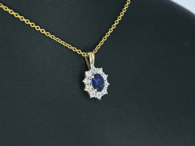 Pendentif Pendentif entourage en or jaune 14 carats, saphir et diamants 58 Facettes 2300