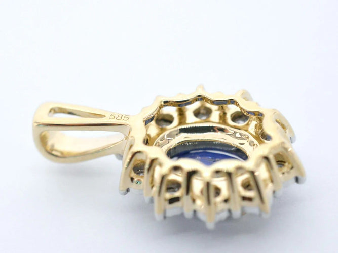 Pendentif Pendentif entourage en or jaune 14 carats, saphir et diamants 58 Facettes 2300