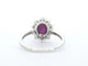 Bague 54 Bague entourage en or blanc 14 carats avec rubis et diamants 58 Facettes 2346