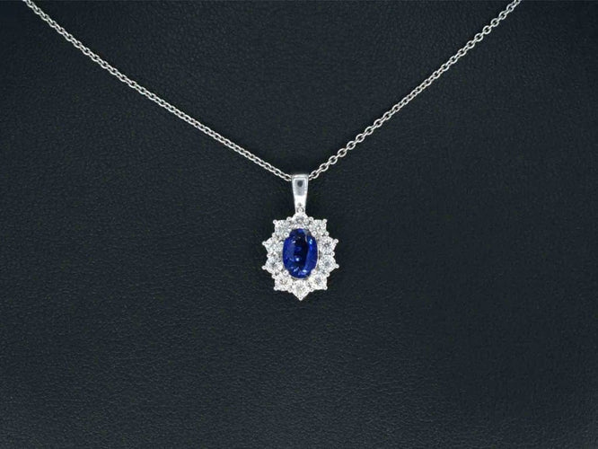 Pendentif Pendentif en or blanc 14 carats avec diamants et saphir 58 Facettes 2299