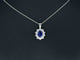 Pendentif Pendentif en or blanc 14 carats avec diamants et saphir 58 Facettes 2299