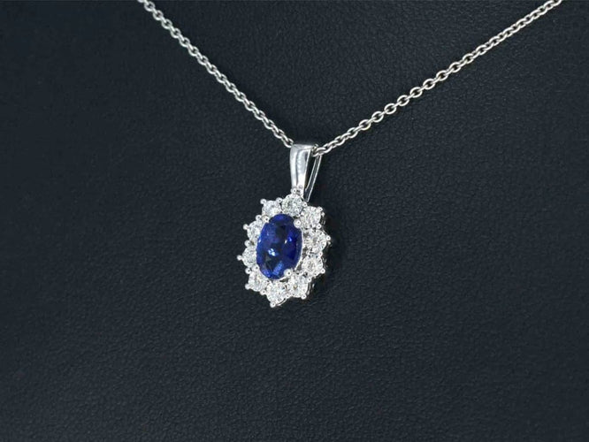 Pendentif Pendentif en or blanc 14 carats avec diamants et saphir 58 Facettes 2299