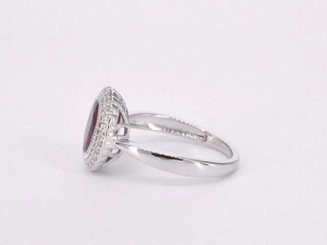Bague 54 Bague entourage en or blanc 14 carats avec diamants et rubis 58 Facettes 2060