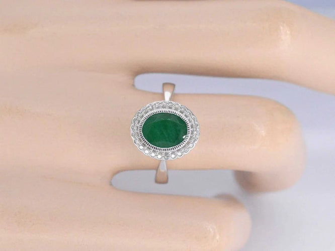 Bague 54 Bague entourage en or blanc 14 carats avec diamants et émeraude 58 Facettes 2061