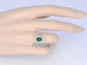 Bague 54 Bague entourage en or blanc 14 carats avec diamants et émeraude 58 Facettes 2061