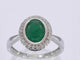 Bague 54 Bague entourage en or blanc 14 carats avec diamants et émeraude 58 Facettes 2061