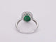 Bague 54 Bague entourage en or blanc 14 carats avec diamants et émeraude 58 Facettes 2061