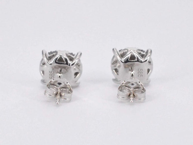 Boucles d'oreilles Boucles d’oreilles en or blanc 14 carats avec diamant taille brillant 58 Facettes 2108