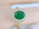 Bague 54 Bague entourage en or jaune 14 carats avec diamants et émeraude 58 Facettes 2144