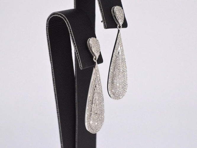 Boucles d'oreilles Boucles d’oreilles en or blanc 14 carats serties de diamants 58 Facettes 2159