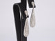 Boucles d'oreilles Boucles d’oreilles en or blanc 14 carats serties de diamants 58 Facettes 2159