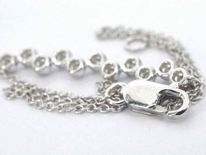 Bracelet Bracelet en or blanc 14 carats avec diamant 58 Facettes 2360