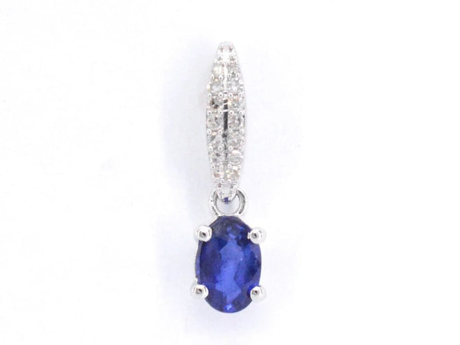 Pendentif Pendentif entourage en or blanc 14 carats avec diamants et saphir 58 Facettes 2032