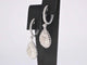 Boucles d'oreilles Boucles d'oreilles en forme de larme en or blanc 14 carats et diamants 58 Facettes 2055