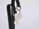 Boucles d'oreilles Boucles d'oreilles en forme de larme en or blanc 14 carats et diamants 58 Facettes 2055