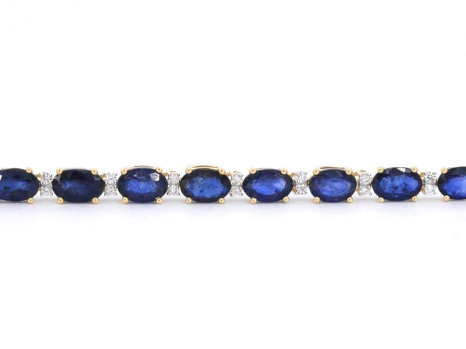 Bracelet Bracelet tennis en or 14 carats avec diamants et saphir 58 Facettes 2063