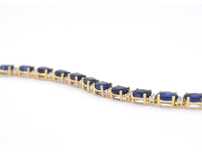Bracelet Bracelet tennis en or 14 carats avec diamants et saphir 58 Facettes 2063