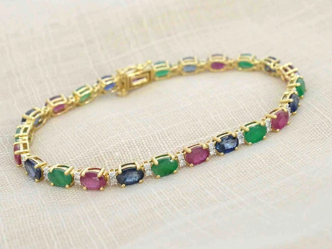 Bracelet Bracelet tennis en or 14 carats avec diamants, saphir, rubis et émeraude 58 Facettes 2069