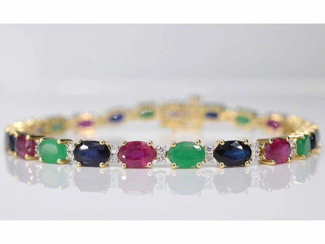 Bracelet Bracelet tennis en or 14 carats avec diamants, saphirs, rubis et émeraudes 58 Facettes 2069