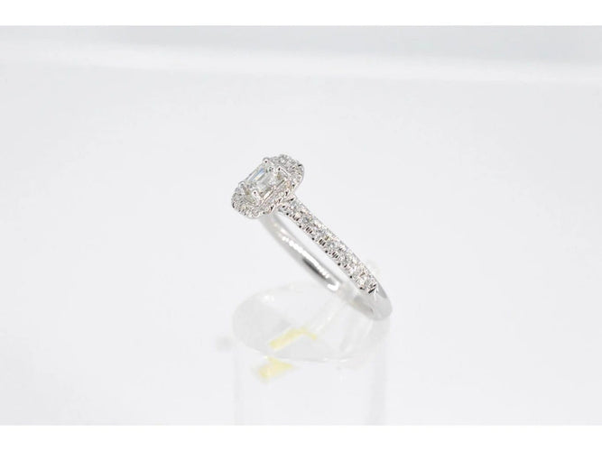 Bague 54 Bague entourage en or blanc avec diamants taille brillant et baguette 58 Facettes 2086