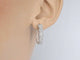 Boucles d'oreilles Boucles d'oreilles créoles en or blanc 14 carats avec diamants 58 Facettes 2111