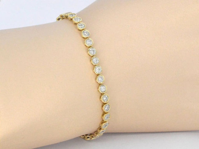 Bracelet Bracelet en or jaune 14 carats serti de diamants 58 Facettes 2172