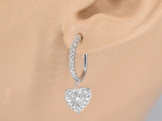 Boucles d'oreilles Boucles d’oreilles cœur en or blanc 14 carats et diamants 58 Facettes 2174