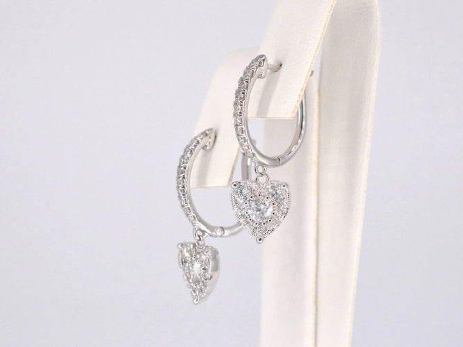 Boucles d'oreilles Boucles d’oreilles cœur en or blanc 14 carats et diamants 58 Facettes 2174