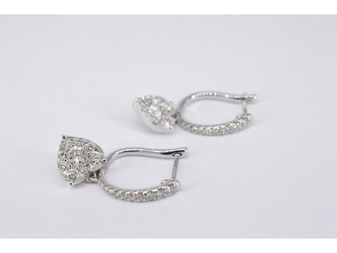 Boucles d'oreilles Boucles d’oreilles cœur en or blanc 14 carats et diamants 58 Facettes 2174