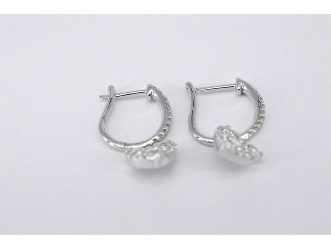 Boucles d'oreilles Boucles d’oreilles cœur en or blanc 14 carats et diamants 58 Facettes 2174