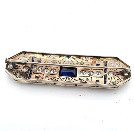 Broche Broche années 1940 en or blanc 18 carats, saphirs et diamants 58 Facettes
