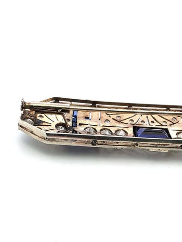 Broche Broche années 1940 en or blanc 18 carats, saphirs et diamants 58 Facettes