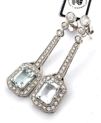 Boucles d'oreilles Boucles d'oreilles en platine avec aigue-marine et diamants 58 Facettes