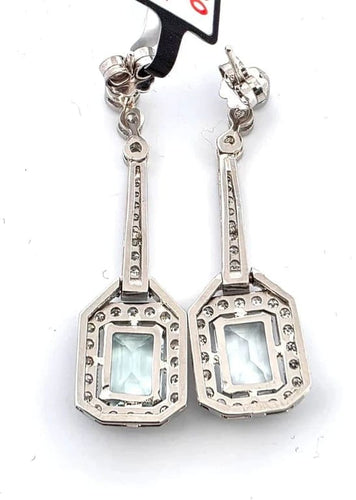 Boucles d'oreilles Boucles d'oreilles en platine avec aigue-marine et diamants 58 Facettes