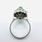 Bague 55 Bague Art déco en or blanc 750 avec diamants et émeraude marquise 58 Facettes 50360