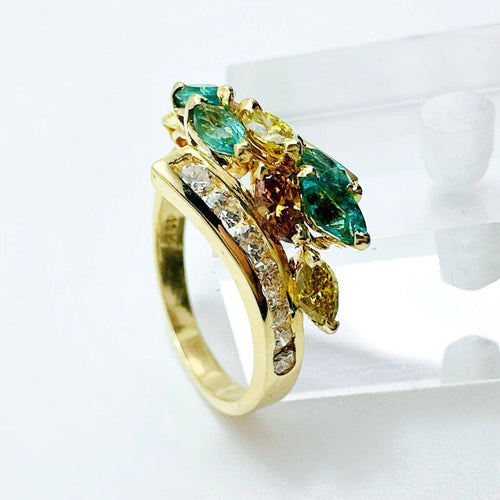 Bague 53 Bague en or jaune 750 sertie de diamants et émeraudes 58 Facettes 50373