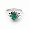 Bague 52 Bague en or blanc 18 carats avec émeraude et diamants 58 Facettes 50376