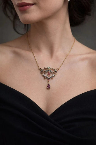 Pendentif Pendentif vintage - Rubis et diamants en or jaune 14 carats et platine 58 Facettes 50414