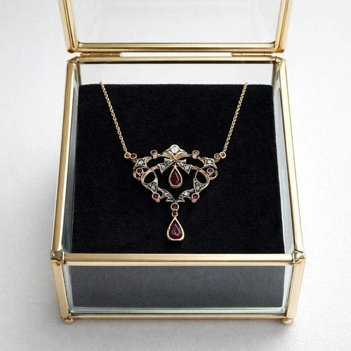 Pendentif Pendentif vintage - Rubis et diamants en or jaune 14 carats et platine 58 Facettes 50414