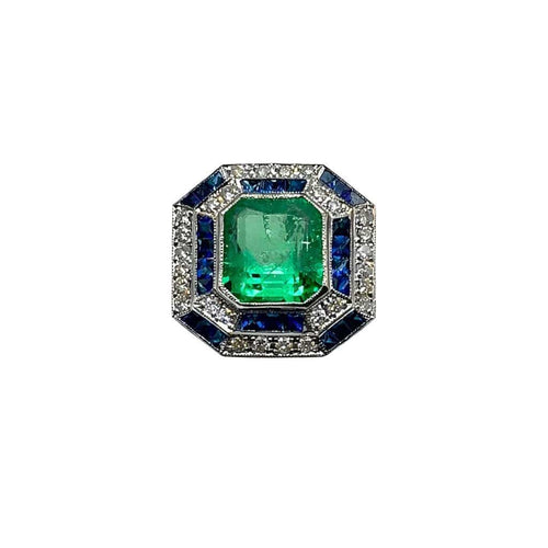 Bague 57 Bague Art déco en or blanc 18 carats, émeraude, saphirs et diamants 58 Facettes 50412