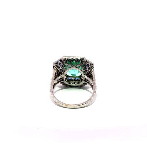 Bague 57 Bague Art déco en or blanc 18 carats, émeraude, saphirs et diamants 58 Facettes 50412