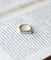 Bague 52 Bague Jarretière Art Déco en or jaune et blanc 18 kt, diamants 58 Facettes