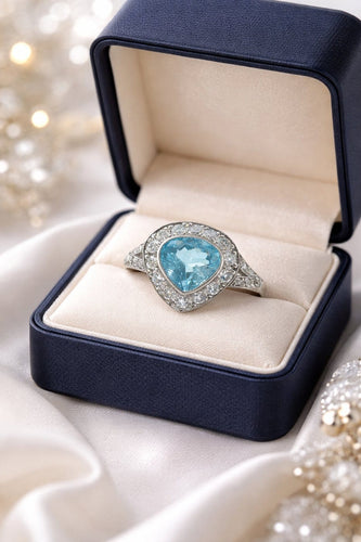 Bague 52 Bague en platine avec aigue-marine poire et halo de diamants 58 Facettes 50253