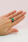 Bague 53 Bague en platine avec émeraude taille cœur, diamants et onyx 58 Facettes 50280