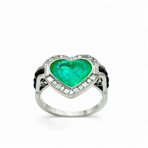 Bague 53 Bague en platine avec émeraude taille cœur, diamants et onyx 58 Facettes 50280